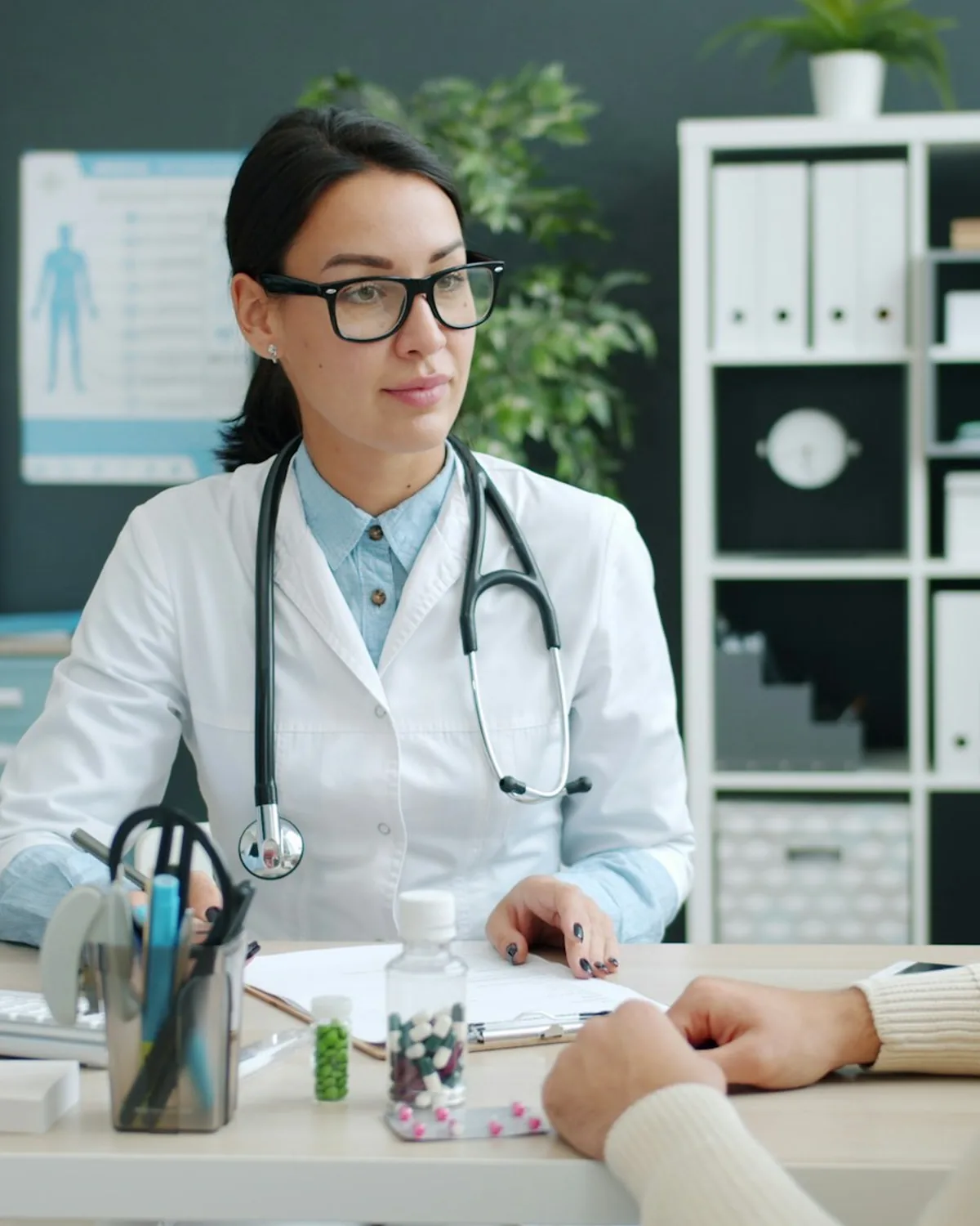 Cardiologist talking with a patient during a consultation